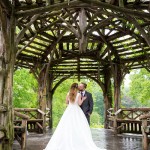 Bride and groom kissing in the Treehouse for Dreaming on a rainy day