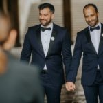 Two Grooms walking to ceremony at Bethesda Fountain