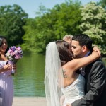 Newlyweds share first kiss on Bethesda Fountain Terrace