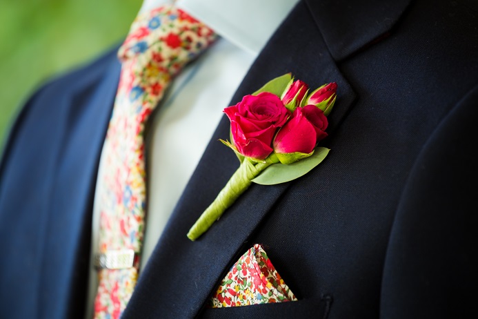 Red spray rose boutonniere