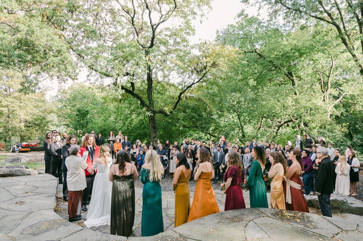 Large wedding ceremony at Summit Rock in Central Park