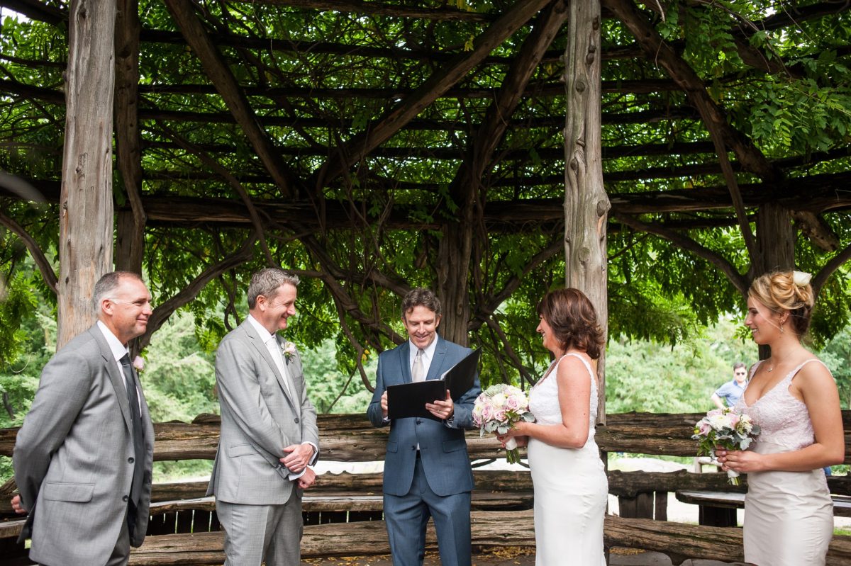 NYC Outdoor Wedding Venues & Locations: Couple getting married inside Cop Cot Central Park