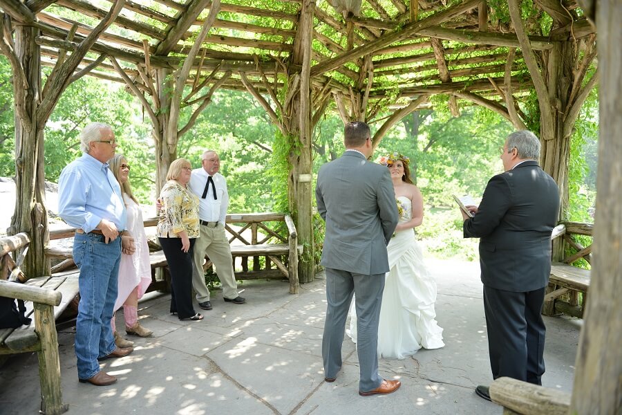 Couple exchanges vows during Central Park wedding ceremony at Dene Summerhouse