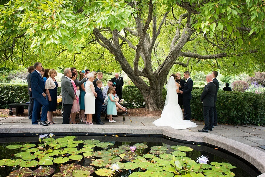 Couple exchanges wedding vows in Central Park's South Garden