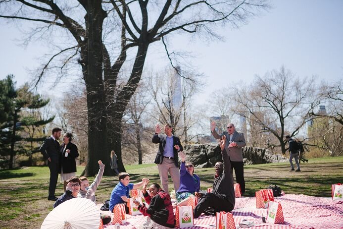 Picnickers wave goodbye in Central Park