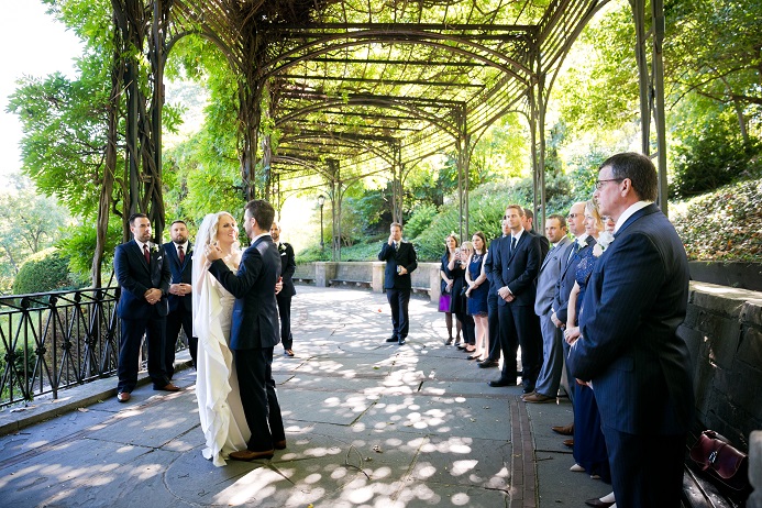 Bride and groom have their first dance under the Wisteria Pergola