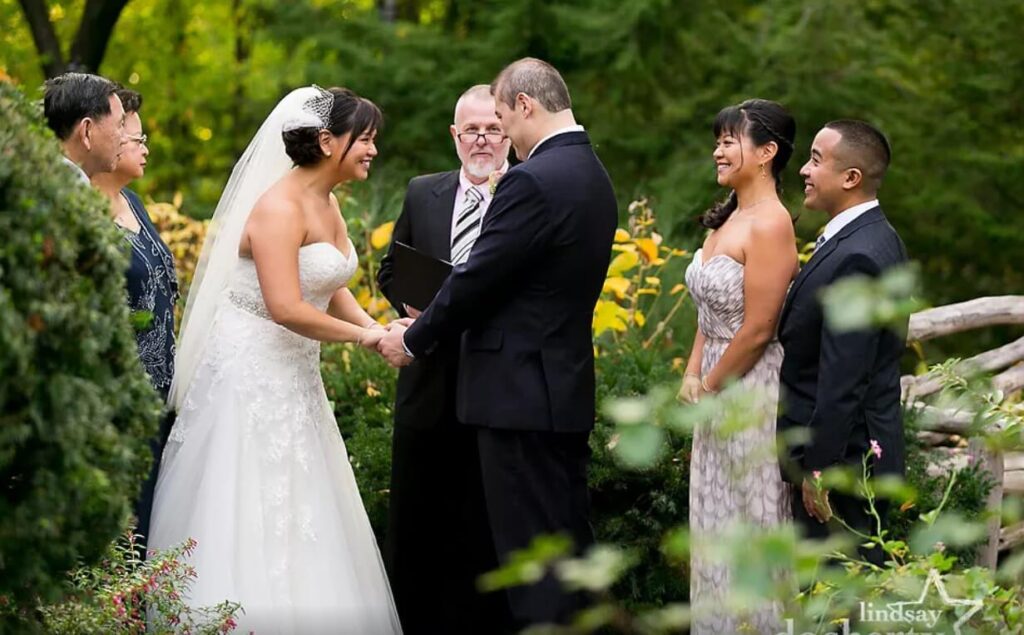 David Gallo officiating a wedding in Shakespeare Garden, Central Park