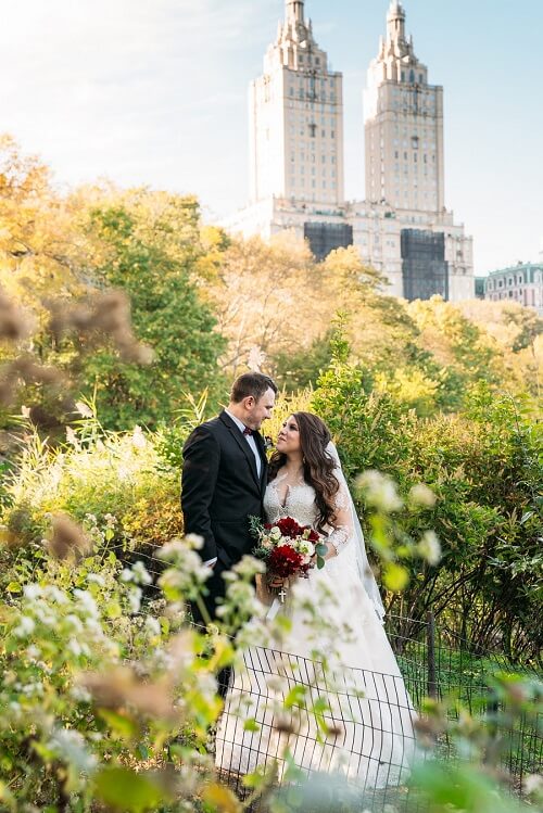 Romantic wedding portrait in Central Park along The Lake